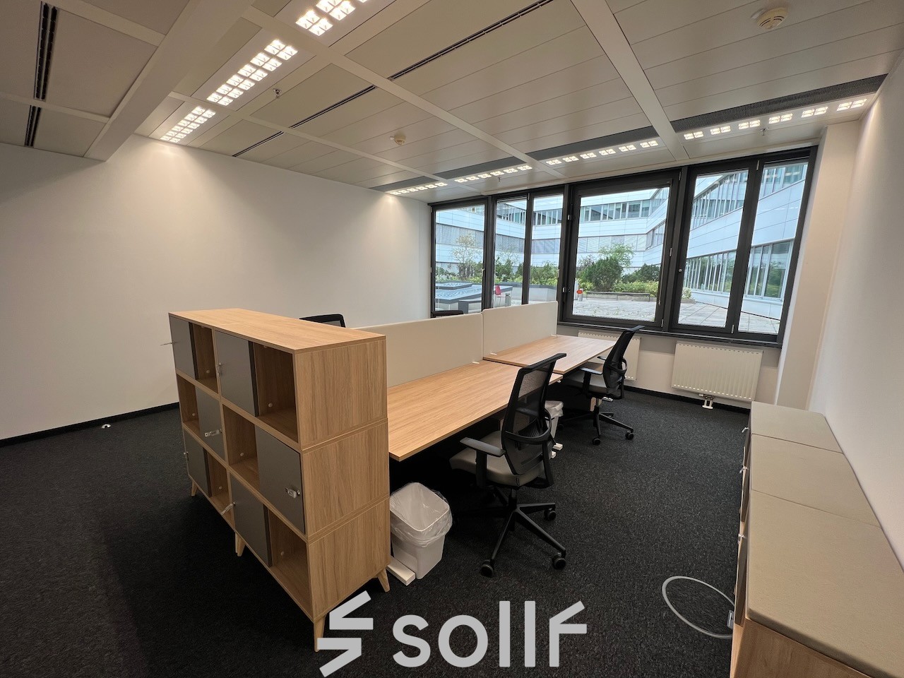 Modern office space rental at Am Euro Platz 2, 1120 Vienna Meidling with well-equipped workstations and natural light.