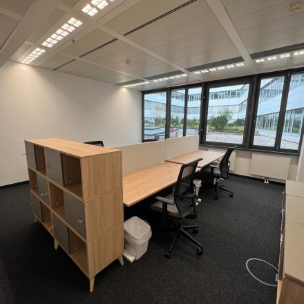 Modern office space rental at Am Euro Platz 2, 1120 Vienna Meidling with well-equipped workstations and natural light.